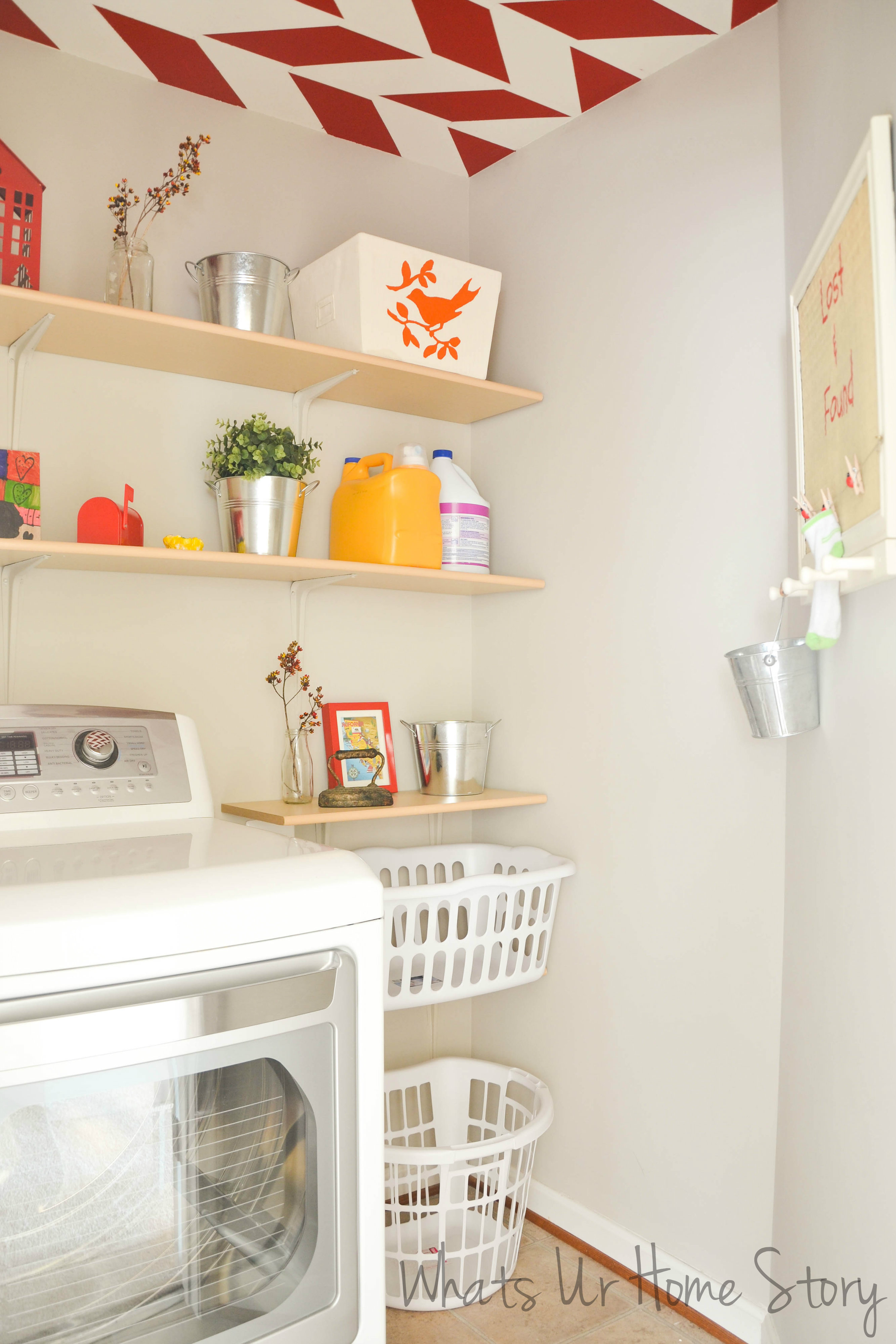 Laundry room with red accents