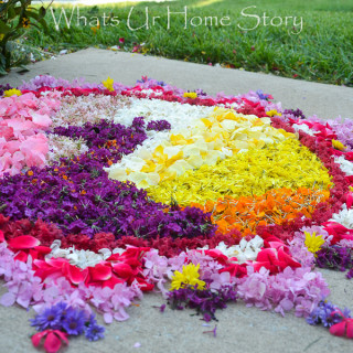 Onam pookalam peacock pattern flower rangoli with peacock design