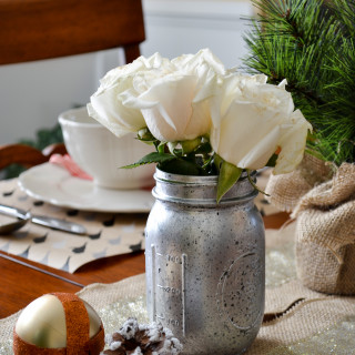 Neutral holiday tablescape with washi tape accents and diy mercury glass mason jar vases